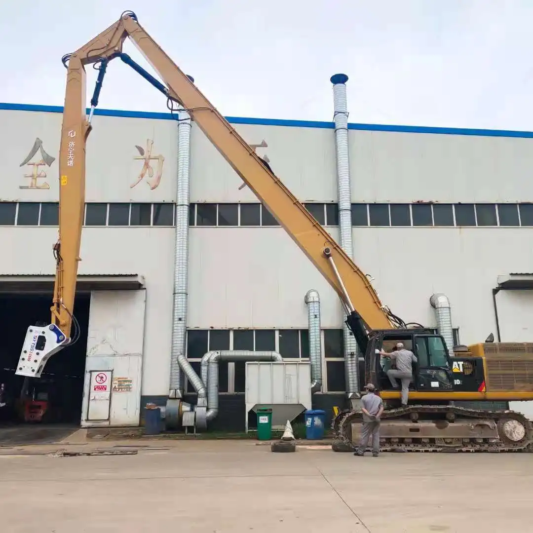 How far down can a three-section demolition boom reach?
